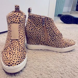 Lightly worn animal print wedge sneakers
